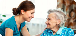caregiver and elderly woman talking