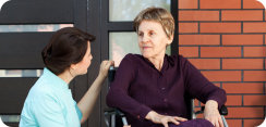 caregiver and elderly woman