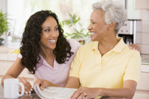 caregiver talking to senior woman